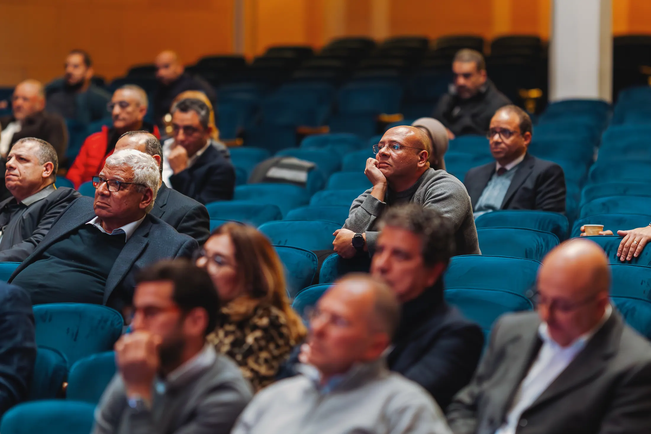 Alumni listening during a PGAE Academy session in Cairo.